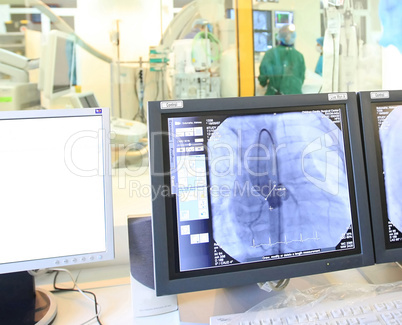 Doctor looking at a computer monitor