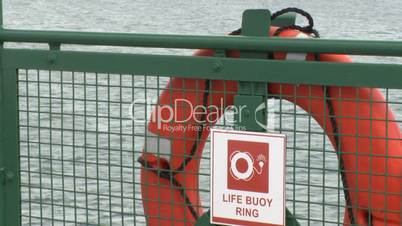 Life Buoy hangs on rail