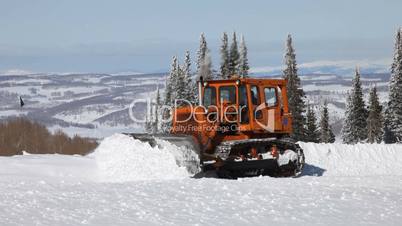 Snow plow tracked mountain