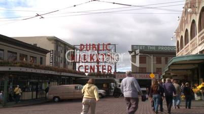 Visitors enter Pike Place Market