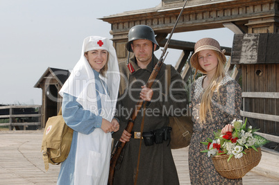 Retro styled picture with two womens and soldier