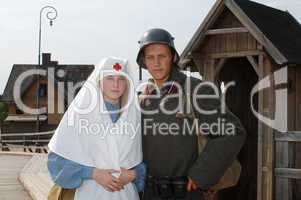 Retro styled picture with nurse and soldier