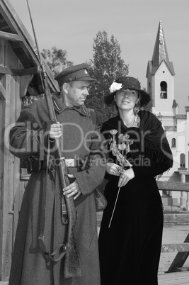 Retro style picture with woman and soldier