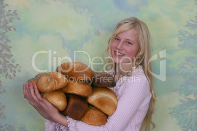 Girl with loafs of bread
