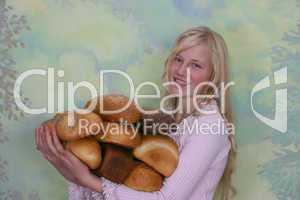 Girl with loafs of bread