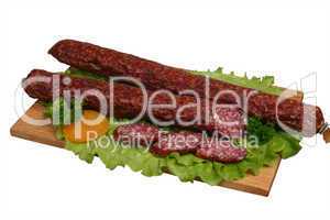 Smoked sausage on wooden board 2