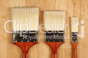Paint Brushes on Wood Surface