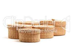 Various Sized Wicker Baskets on White