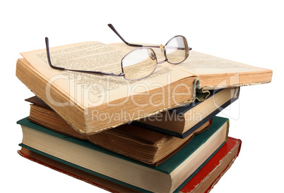 Glasses and open books.