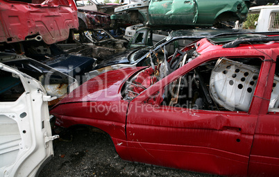 Car cementary with many broken cars