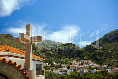 Cross above the town