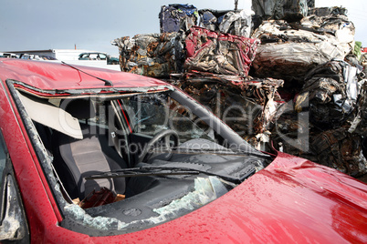 Car cementary with many broken cars