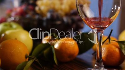 Fresh fruits and pouring wine – dolly shot 2