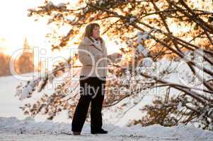 Woman on winters sunset