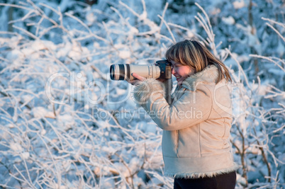 Woman with photo camera