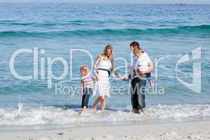 Animated family having fun at the beach