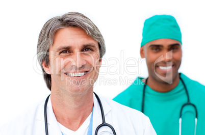 Smiling male doctors standing in a line