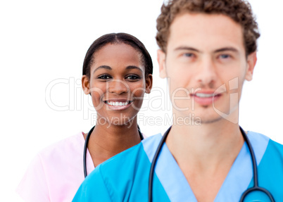 Portrait of young doctors standing in a row