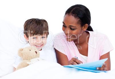 Adorable little boy with his doctor