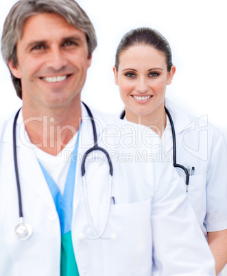Two smiling doctors looking at the camera
