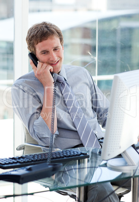 Young businessman talking on phone