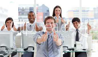Lively business people with thumbs up
