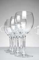 Still-life with empty glasses over white background_3