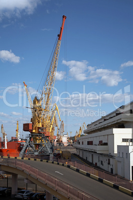 View on the port with loading cargo ship