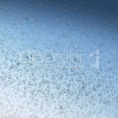 Water drops on blue, shallow DOF