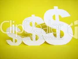 us dollar sign cut from paper