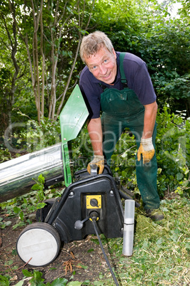 Worker with schredder