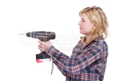 Craftswoman with drill machine