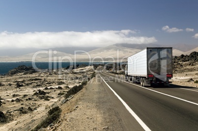 White truck on a Chilean coastal highway