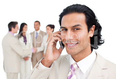 Smiling businessman talking on phone