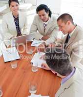 Multi-ethnic business co-workers in a meeting