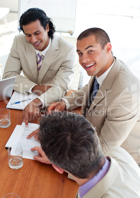 Smiling business co-workers in a meeting