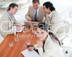 Smiling Asian businesswoman in a meeting