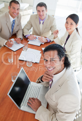 Confident business co-workers in a meeting