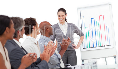 Cheerful business people clapping a good presentation
