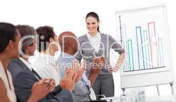 Cheerful business people clapping a good presentation