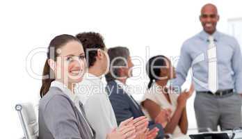 Positive business people clapping a good presentation