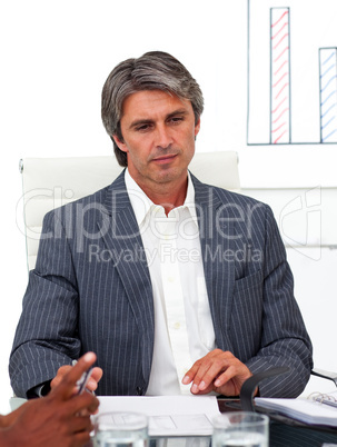 Serious mature manager in a meeting