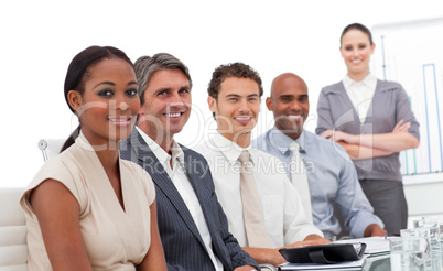 Multi-ethnic business team smiling at the camera