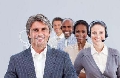 Confident manager in front of his team