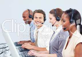 Cheerful business people with headset on