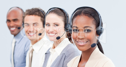 Smiling business team with headset on