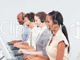 Concentrated business team working in a call center
