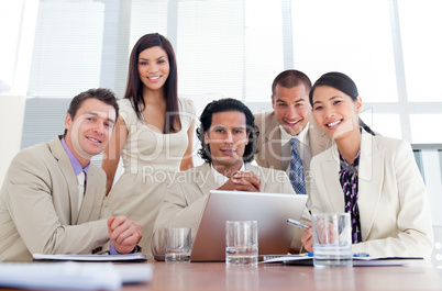 Assertive business partners working at a computer