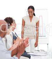 Cheerful business group applauding a presentation