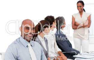 Multi-ethnic business group at a presentation